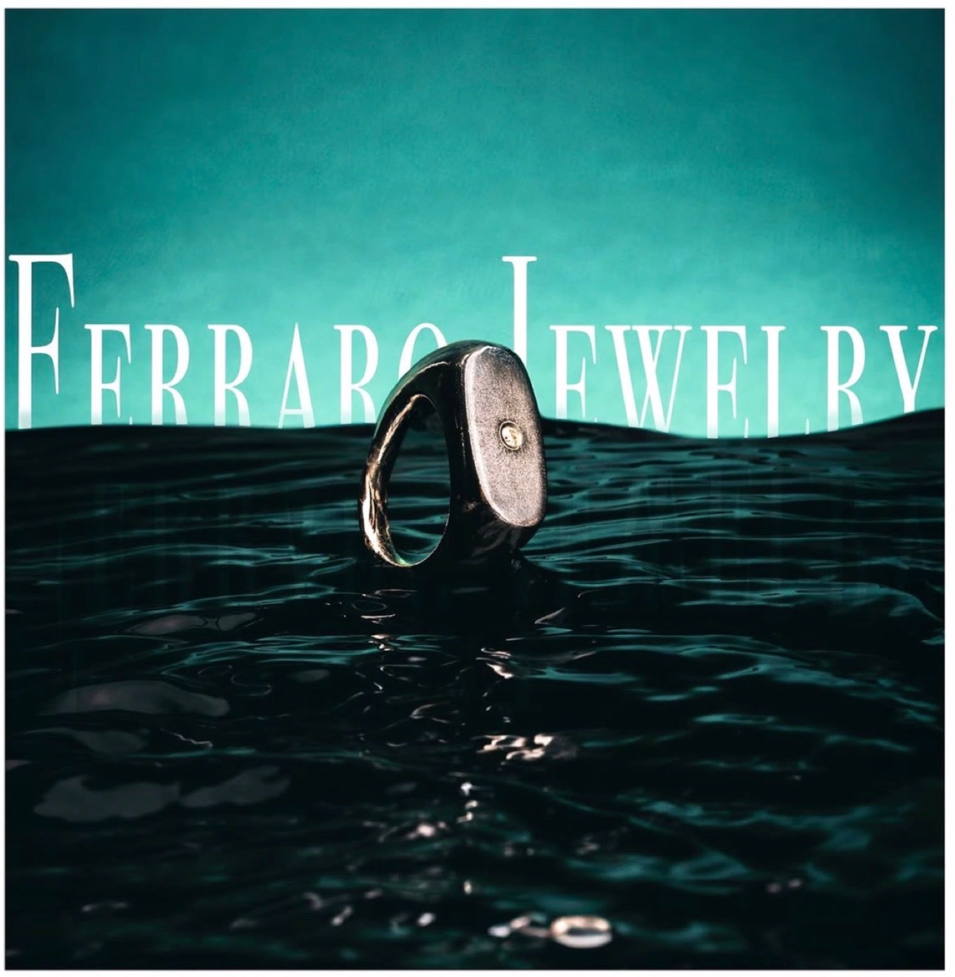 Dark oxidized signet ring with a single small set stone, standing in black water against a teal backdrop, with the words Ferraro Jewelry lettered across the water